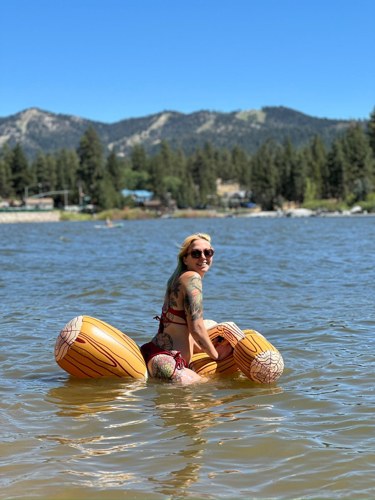 Sarah on a floaty in the lake